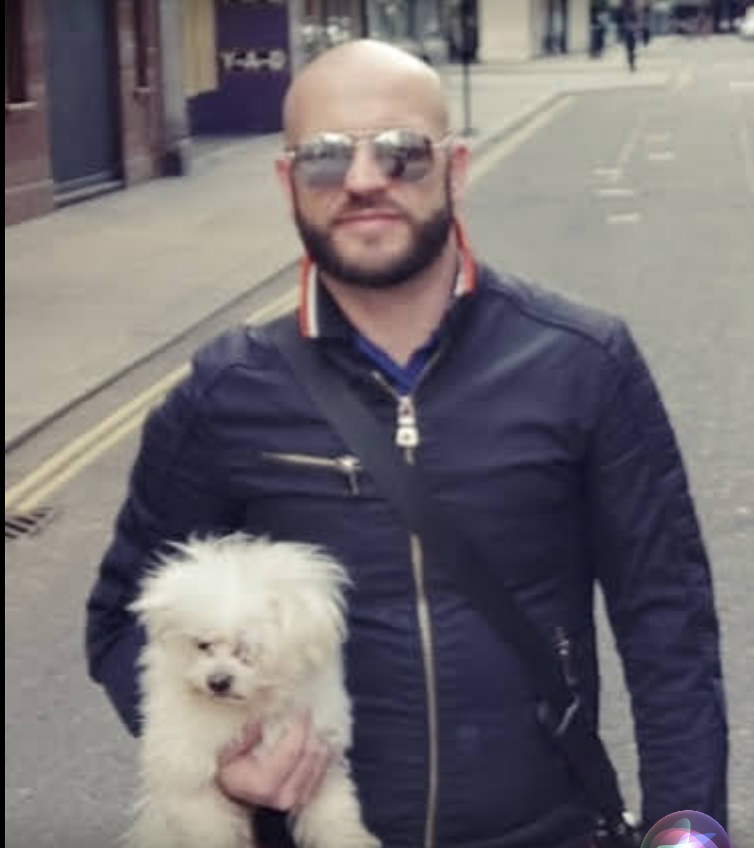 William, founder of Wise Journey Support, with his dog in Covent Garden, London